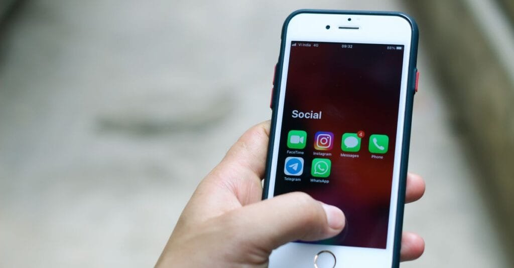 Phone showing Instagram and WhatsApp social apps